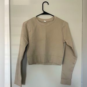 DSG beige long sleeve workout top. Stretchy material very supportive. Size M